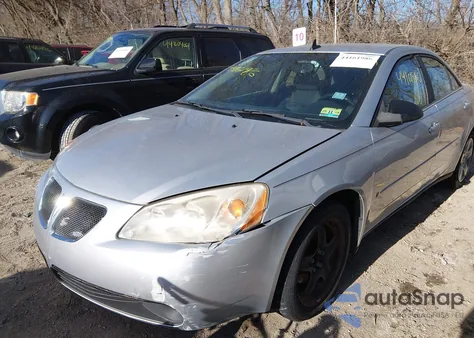 2009 Pontiac G6 z USA, uszkodzony, nr VIN 1G2ZG57B594171487